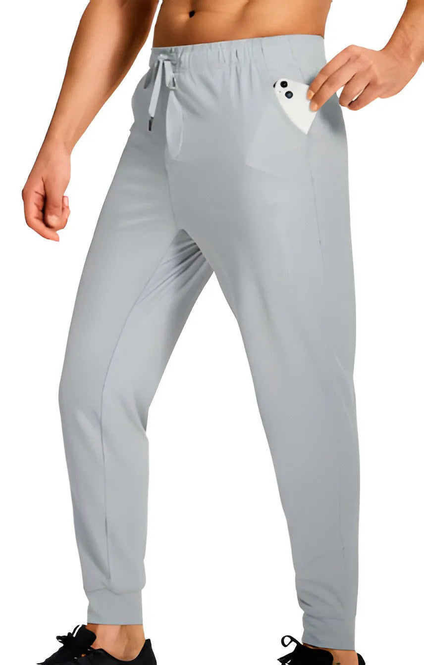 Men's loose casual trousers in polyester fabric available in multiple colours and sizes