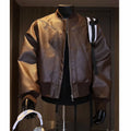 Men's black fitted PU leather jacket with litchi grain texture and 100cm extended length.