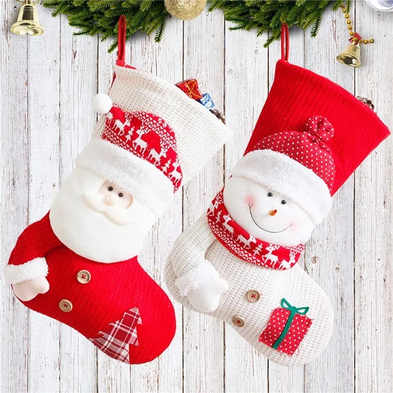 Large red and white knitted Christmas stocking with Santa Claus design for fireplace decor