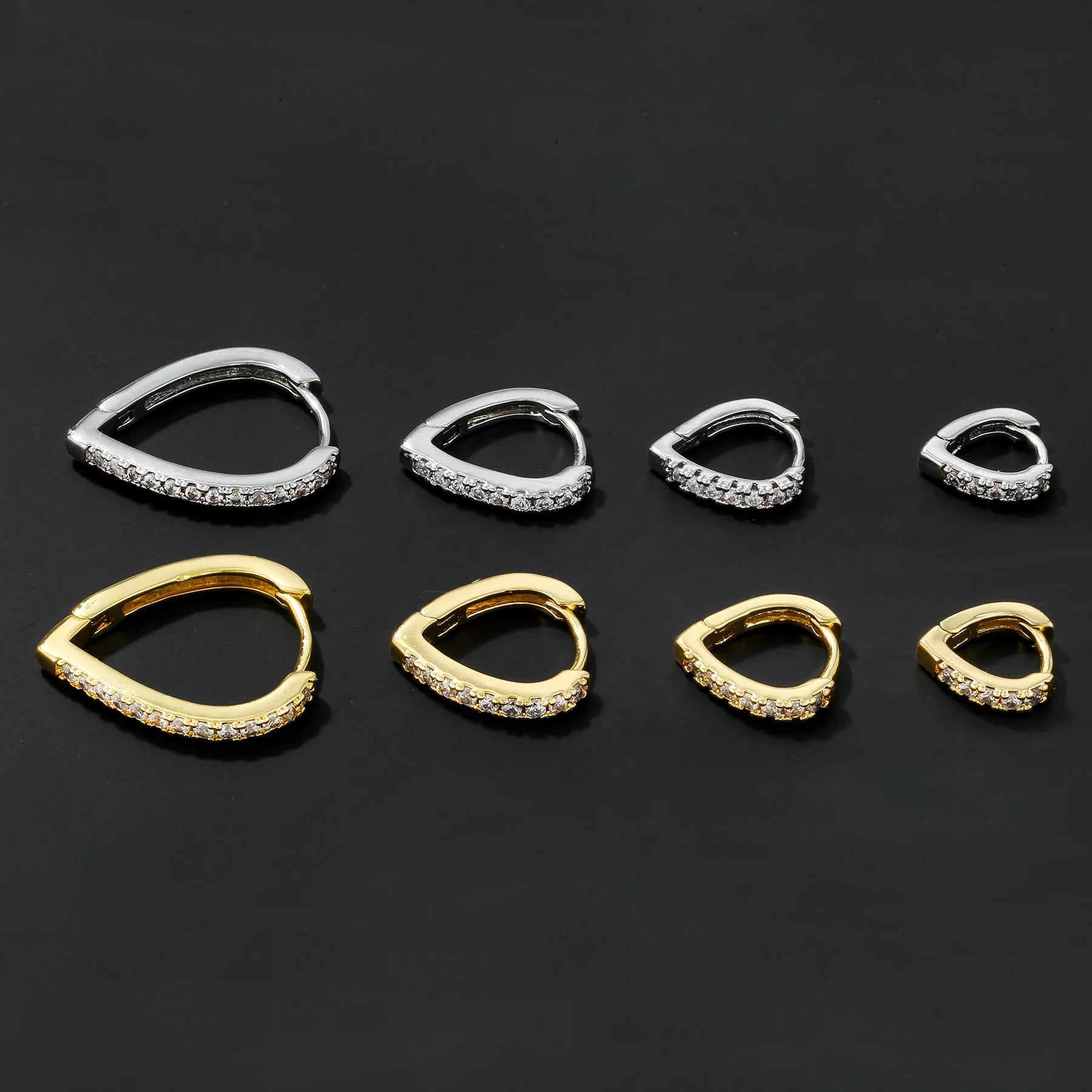 Geometric heart-shaped copper ear clip with electroplated gold finish and clip-on fitting