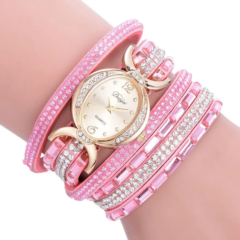 New casual rhinestone watch for women with round stainless steel case, leather band, and analog quartz movement