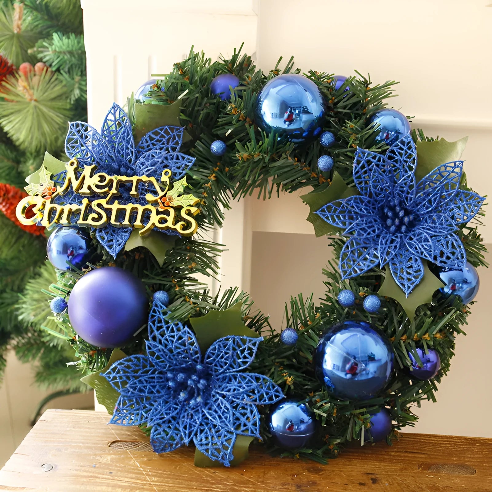 30cm diameter multicolour plastic Christmas wreath decoration showing blue, gold, pink, purple, red, and silver colour options