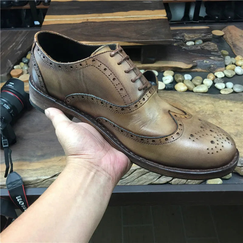 Men's light brown vintage carved leather casual shoes with distressed finish and lace-up design