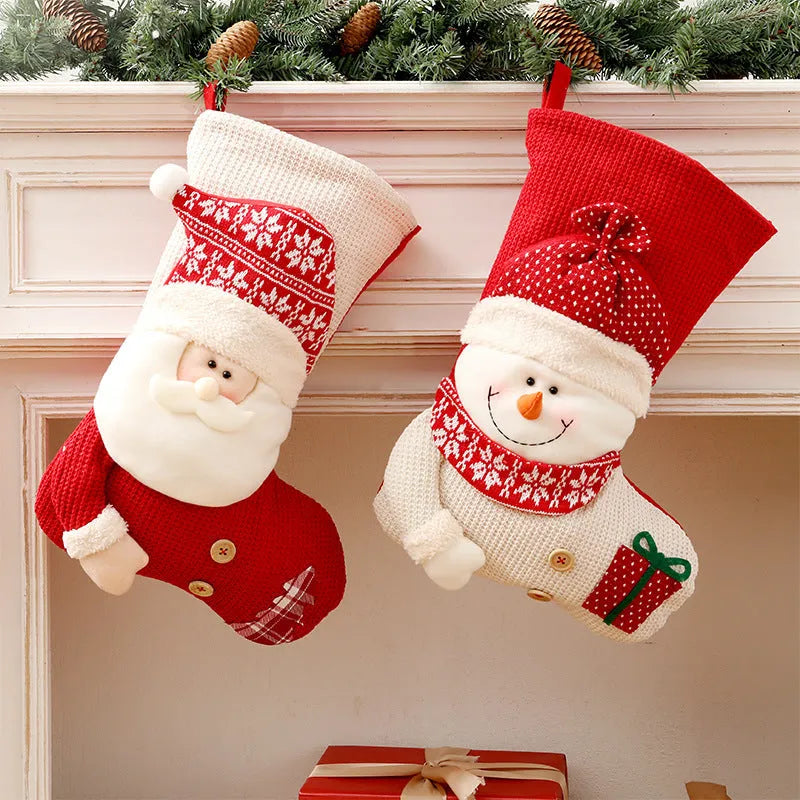 Large red and white knitted Christmas stocking with Santa Claus design for fireplace decor