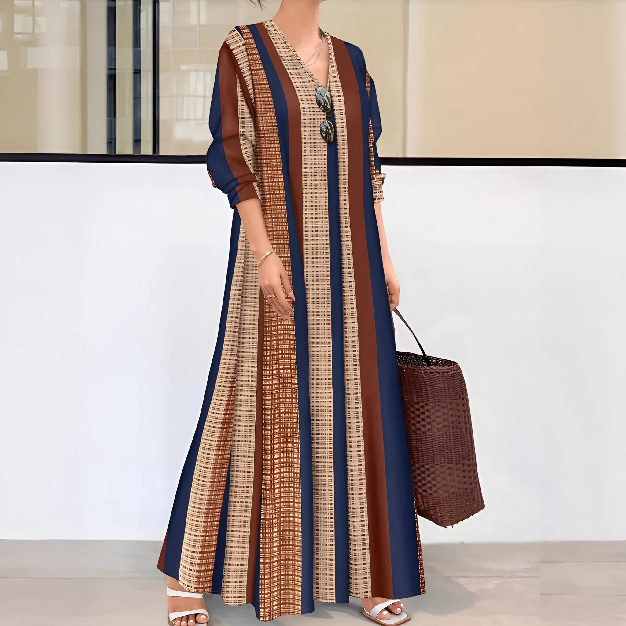 Camel coloured women's vertical striped V-neck long dress with A-line skirt and long sleeves