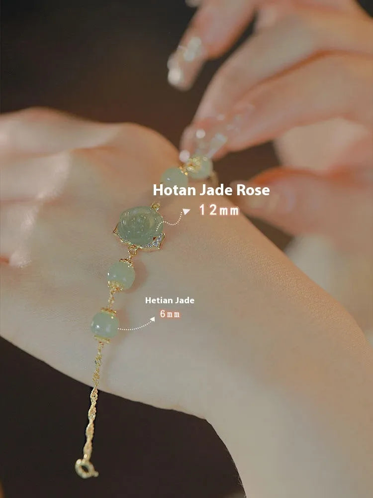 Handmade women's bracelet with rose-coloured Hetian Jade and 14K gold-plated finish in a floral design.