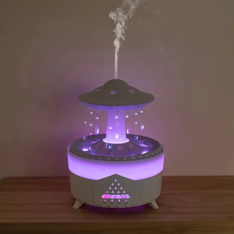 White cloud-shaped UFO raindrop humidifier with water mist and coloured lights