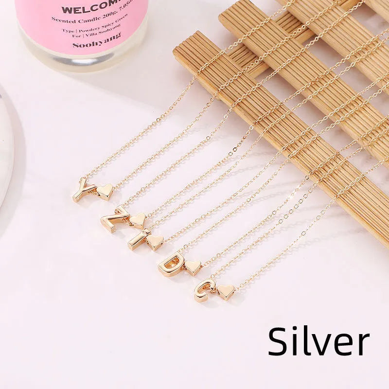 Set of 26 English alphabet alloy charm pendants in gold and silver electroplated finish