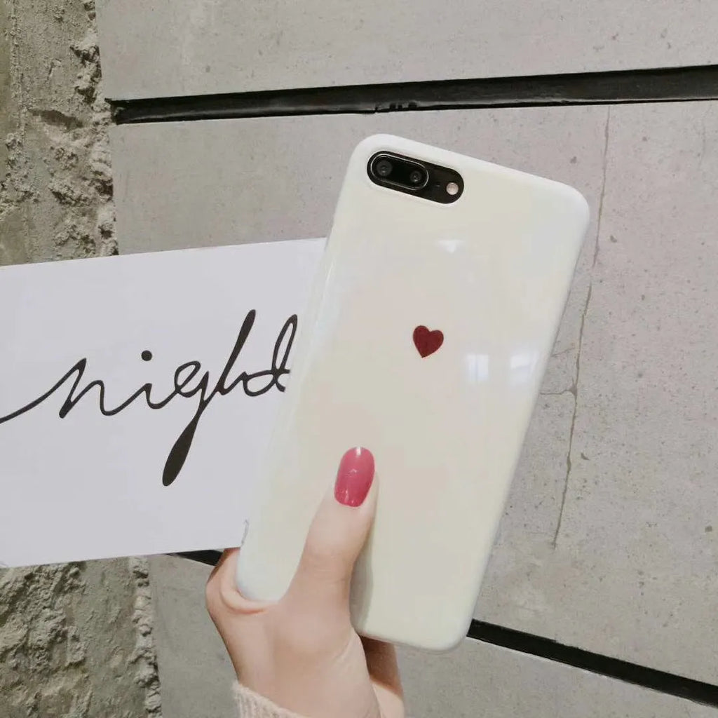 Clear transparent iPhone case with love heart design and blue light effect for iPhone models