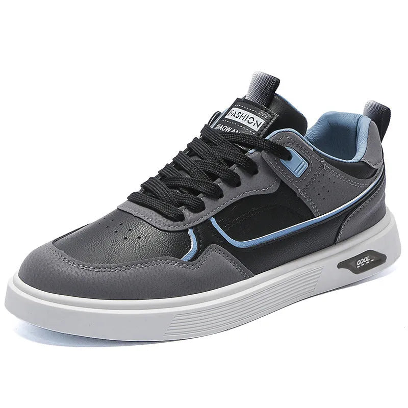 Men's low-top canvas board shoes in beige with leather stitching detail on a white background.