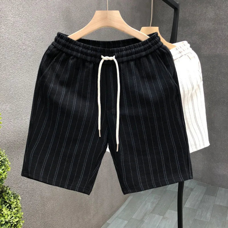 Men's black and white striped fleece-lined casual shorts with elastic waistband