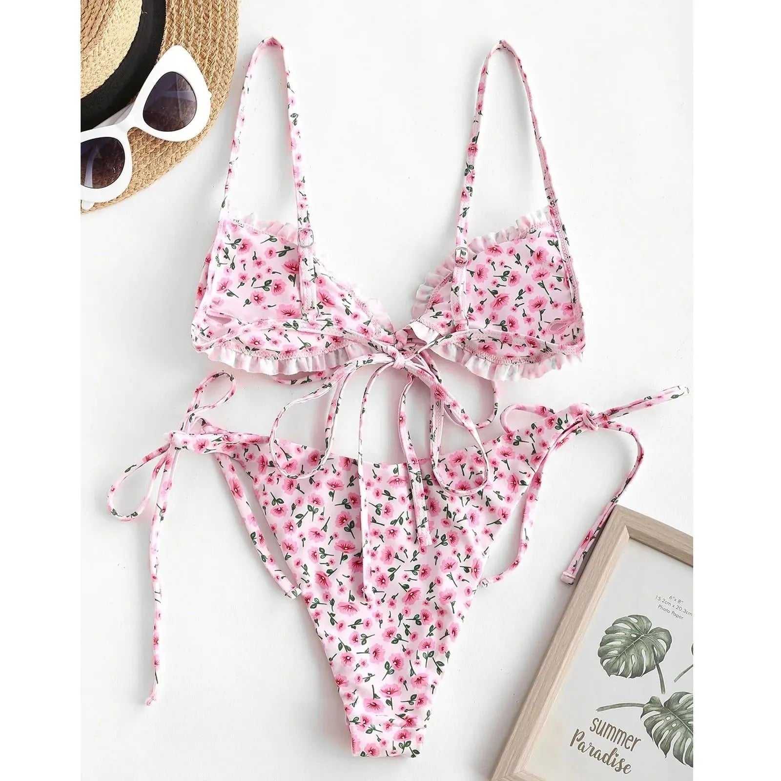 Women's printed multi-rope banded bikini swimsuit in blue or pink polyester with short sleeves
