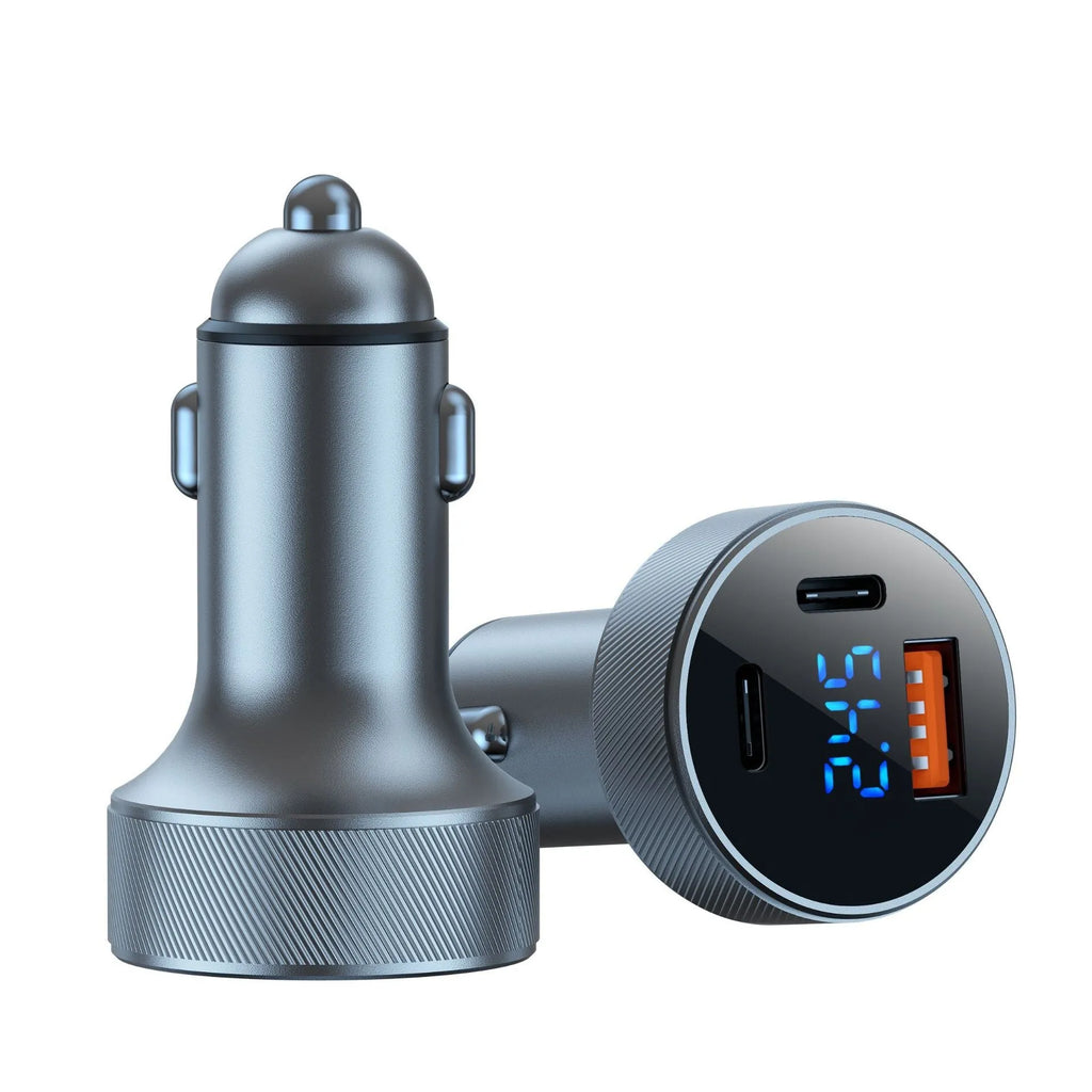 Black and iron grey aluminium alloy car charger with digital display plugged into a vehicle cigarette lighter