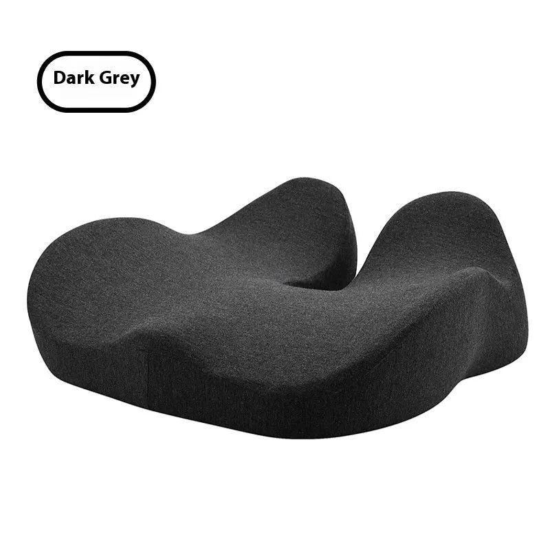 Light grey memory foam office chair cushion with non-slip backing on a desk chair.
