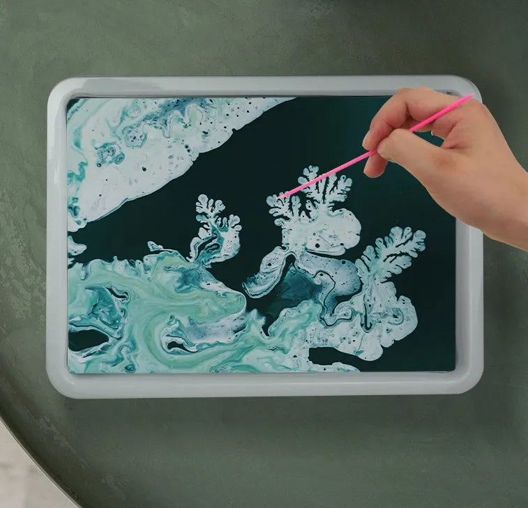 Children's floating painting educational toy kit with gouache pigments, painting liquid, drawing papers and stirring rods