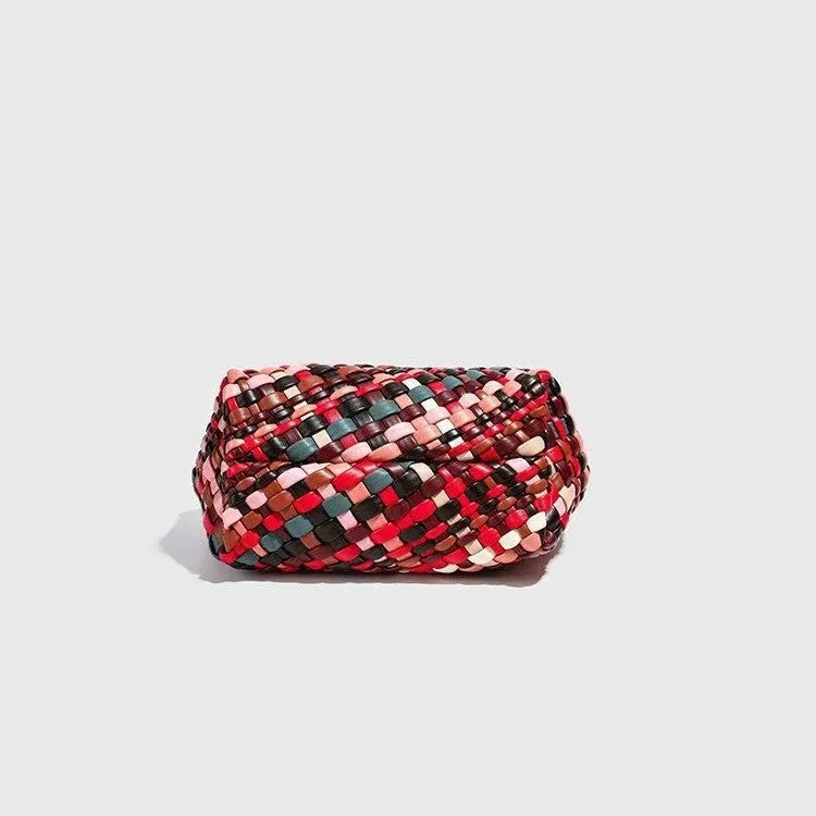Women's colour woven PU leather shoulder bag showing handmade texture and 18x11x14 cm dimensions