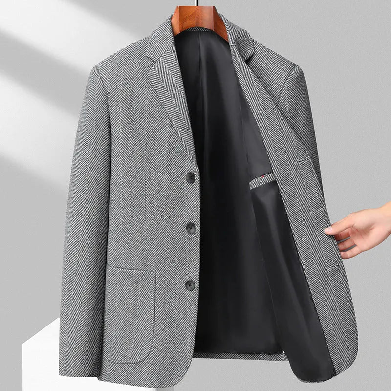 Man wearing a loose-fit solid colour wool-blend coat suitable for spring or autumn casual wear.