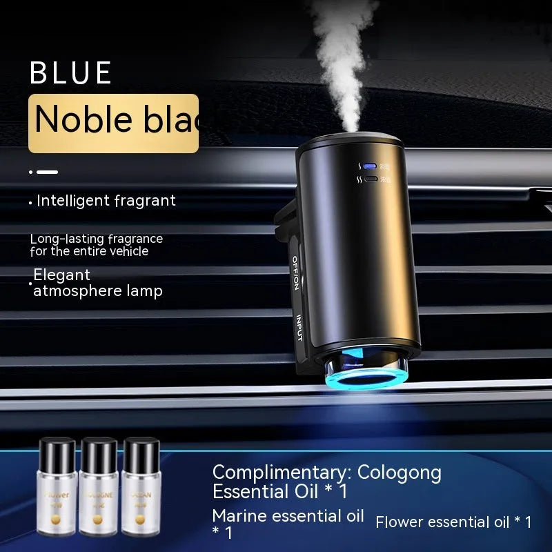 Obsidian black car vent clip aroma diffuser with essential oil bottle on a car air vent