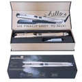 Mini steam hair straightener in champagne colour with styling plates visible