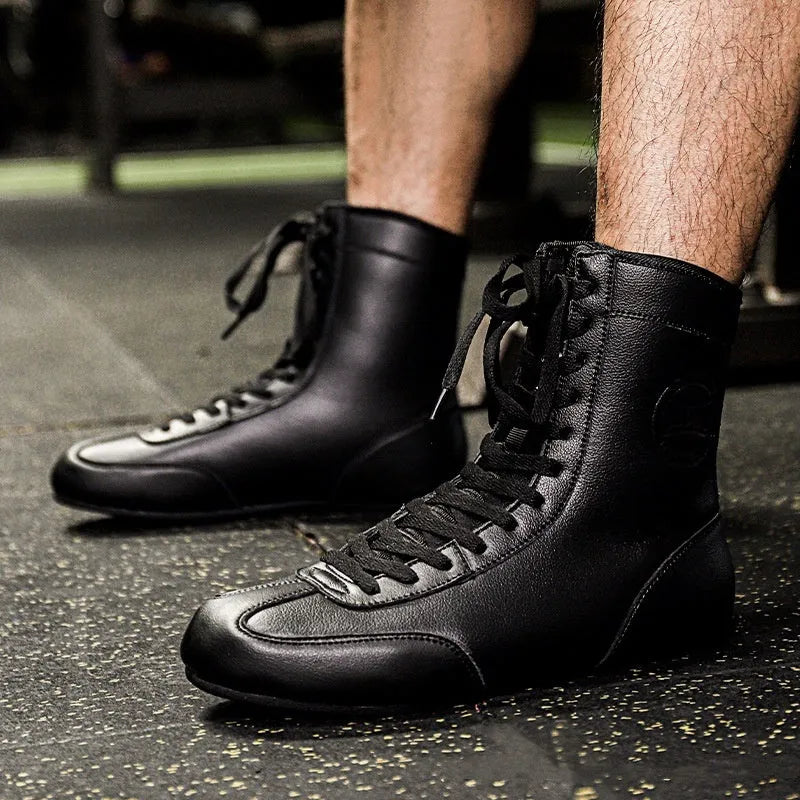 Black gold mesh professional boxing shoes with white leather accents and rubber sole