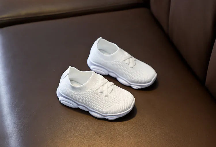 Children's fabric slip-on shoes with non-slip rubber soles in white, black, pink or grey colours