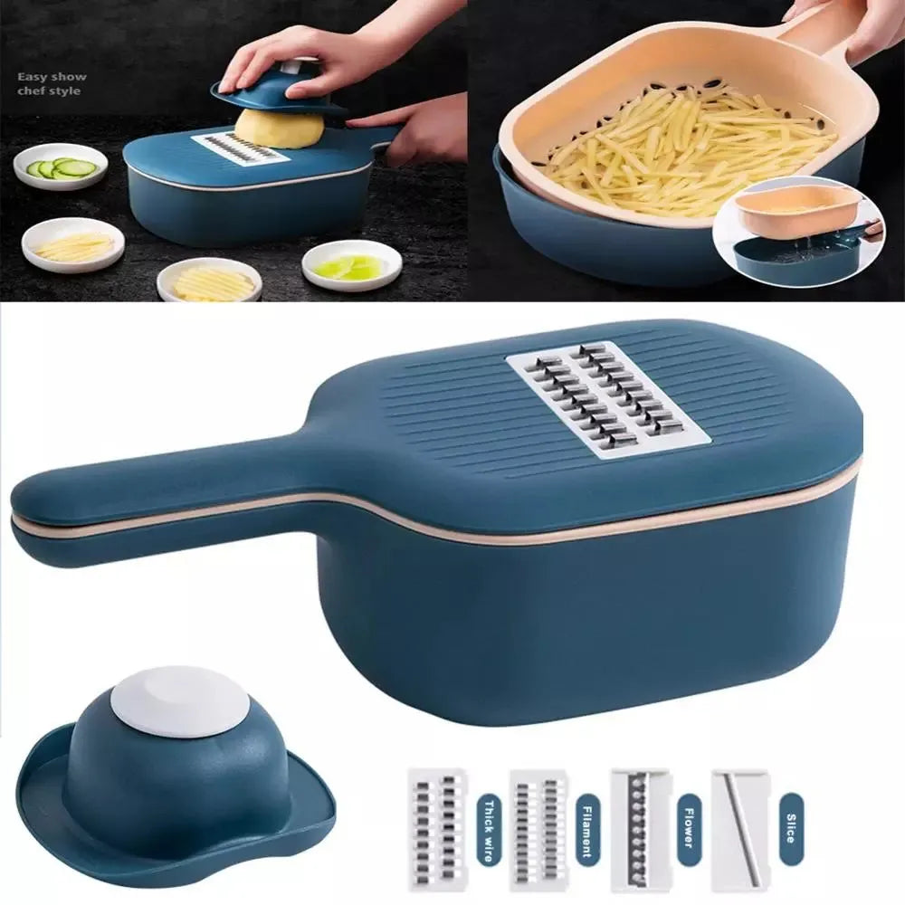 Dark blue vegetable cutter with four stainless steel blades, a drain basket, and a hand guard on a kitchen counter.
