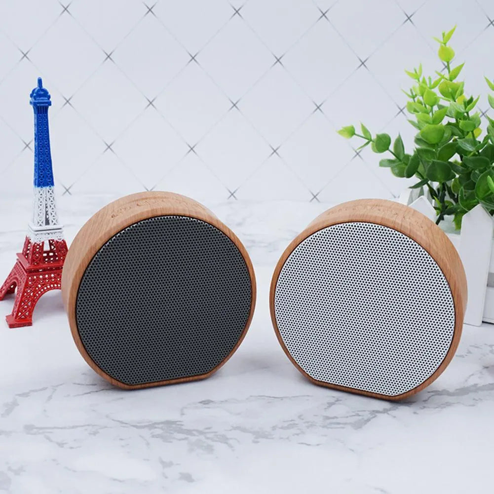 Mini wood Bluetooth speaker in white with bass diaphragm and Micro USB port