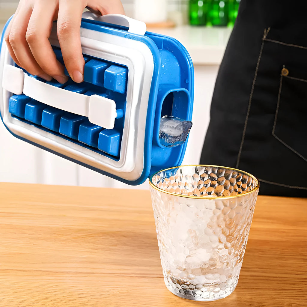 Blue silicone ice cube tray with 36 square cavities and a lid on a wooden table