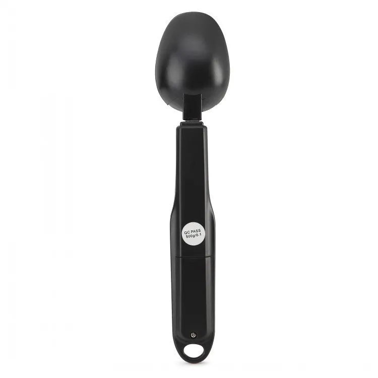 Black digital measuring spoon with LCD display showing weight measurement for kitchen use