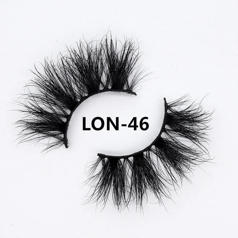Real mink hair false eyelashes in 25MM3D length with fluffy handmade lash strands on a white background