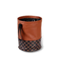 Retractable leather car bin in folded and expanded states showing handle and waterproof construction