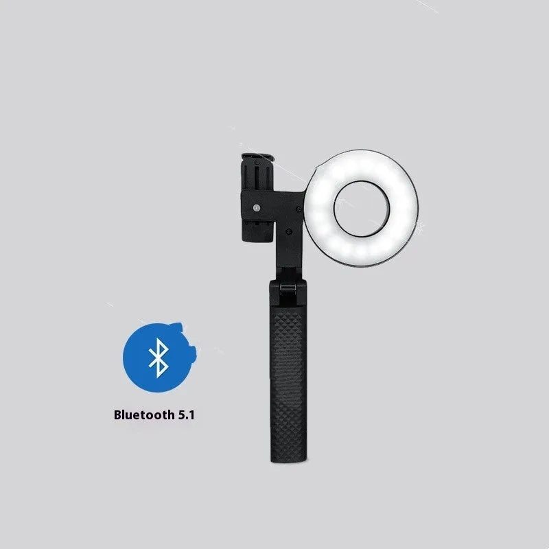 Black portable handheld LED fill light for phone photography measuring 14.5 by 25.8 by 4.7 centimetres
