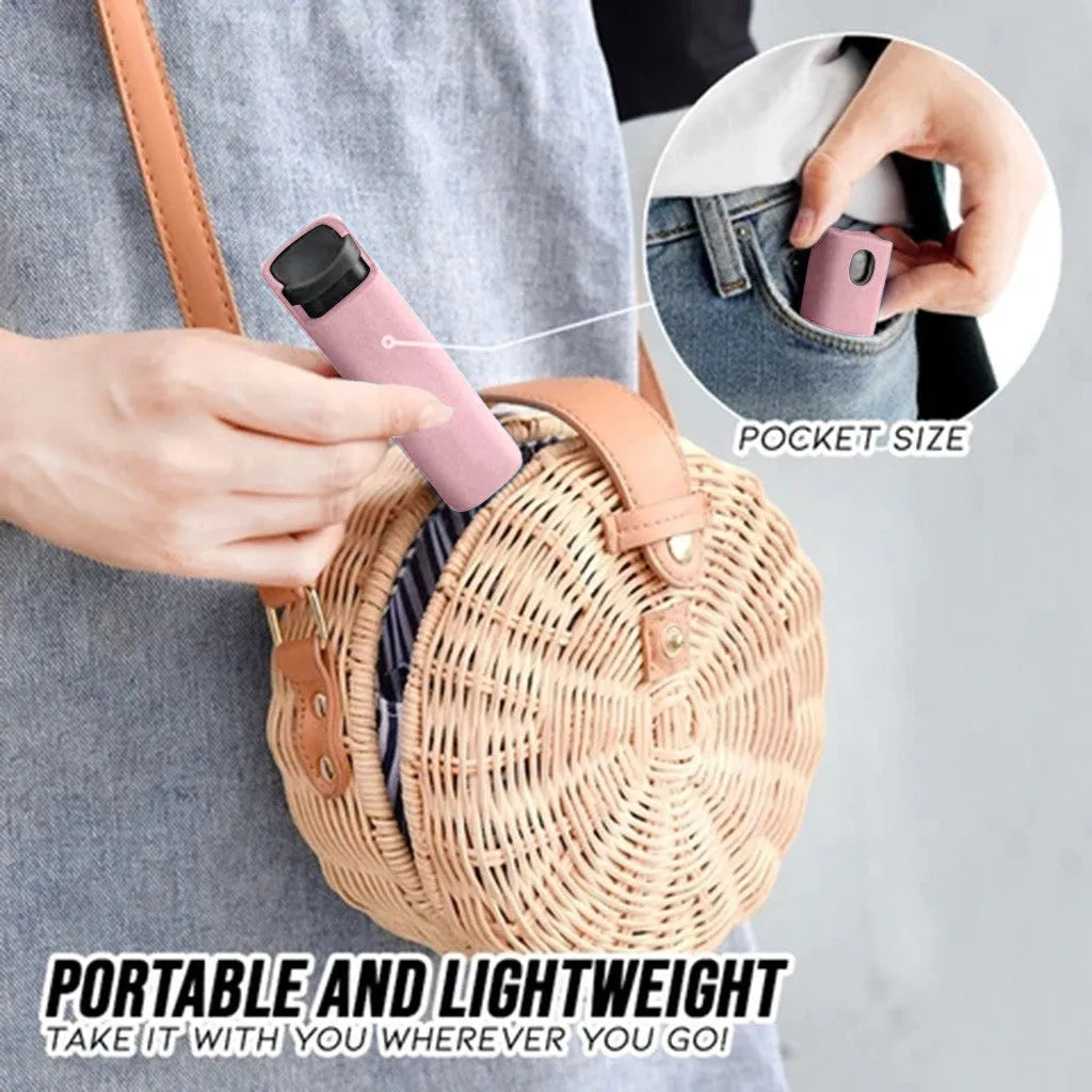 Portable screen cleaner bottle in blue and pink with attached microfiber cloth for cleaning phones and tablets