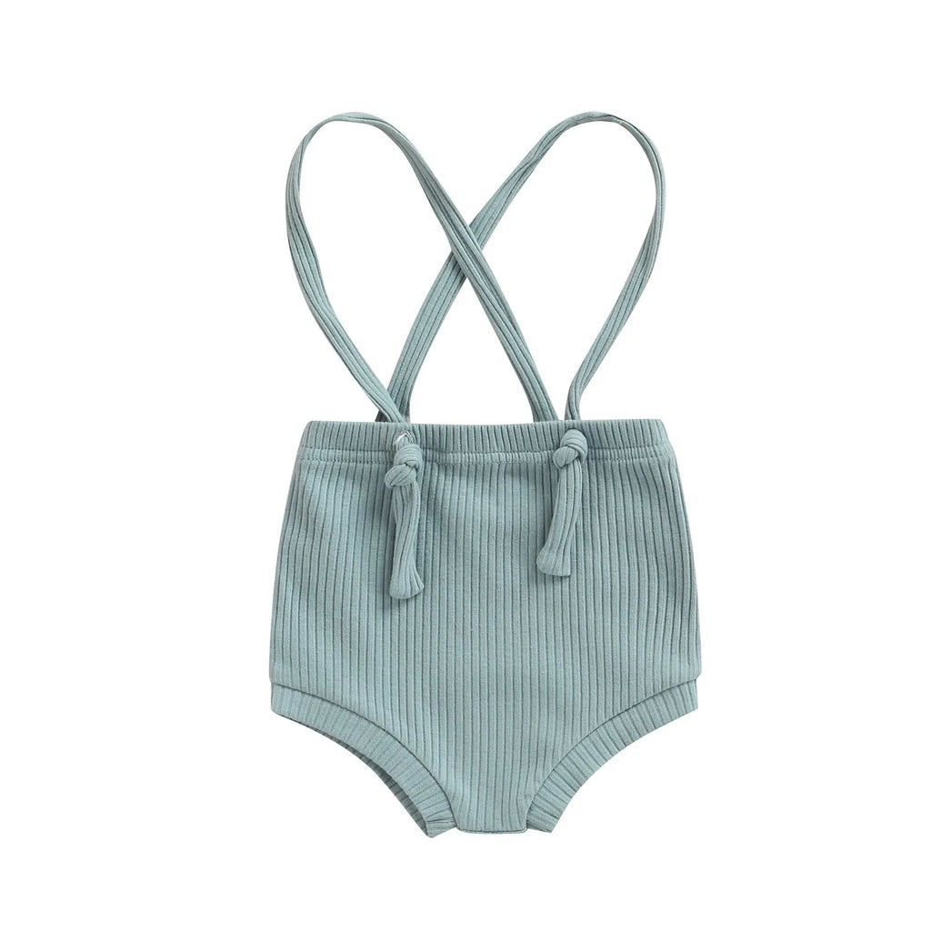 Baby carrier high waist triangle bottoming stretch pants in cotton solid colour on a model infant