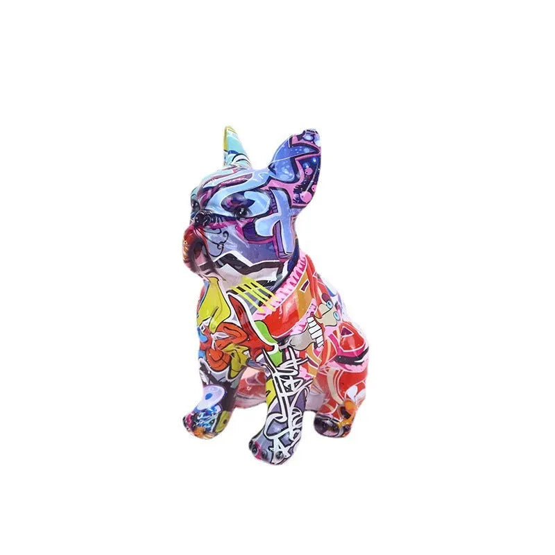 Graffiti-coloured resin French bulldog statue on a plain background.