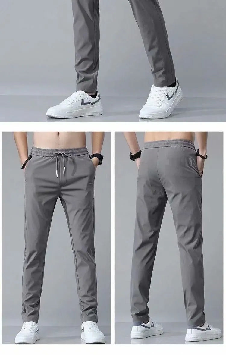 Men's drawstring trousers Korean version loose straight leg sweatpants in khaki colour on model