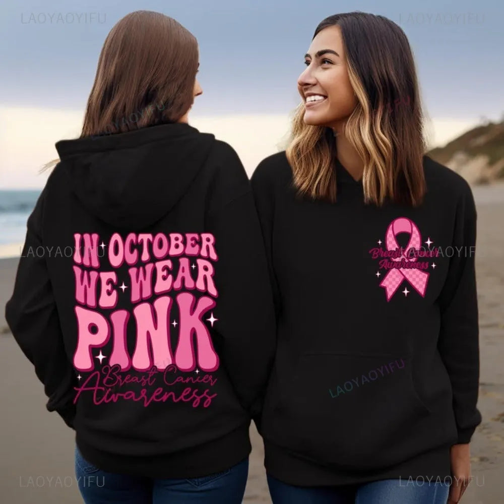 Breast cancer awareness pullover hoodie with retro art design and side seam pocket in pink colour.