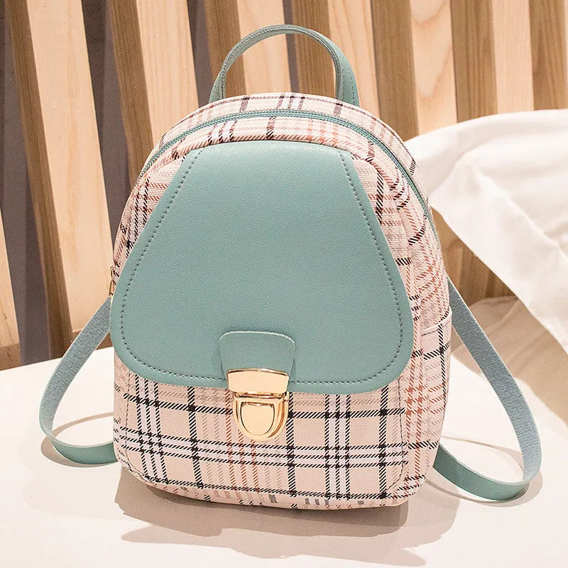 A diagonal one shoulder phone bag in synthetic PU leather, shown in a colour selection.