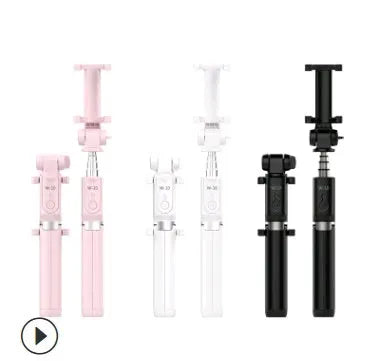 Aluminium Bluetooth selfie stick with tripod base and remote control next to a smartphone