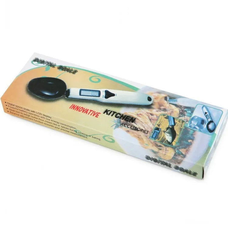 Black digital measuring spoon with LCD display showing weight measurement for kitchen use