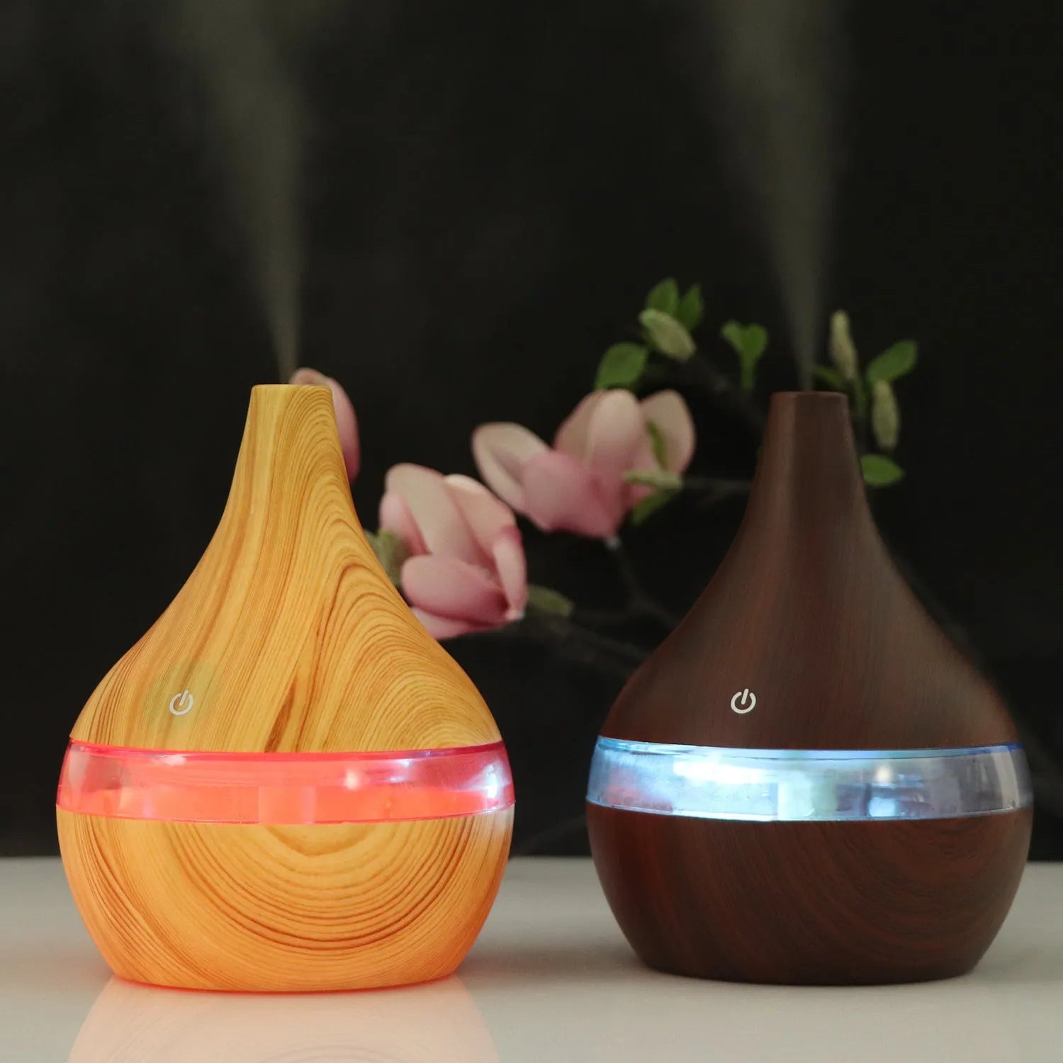 Columnar USB mini air purifier and humidifier in light wood grain finish on a desk.