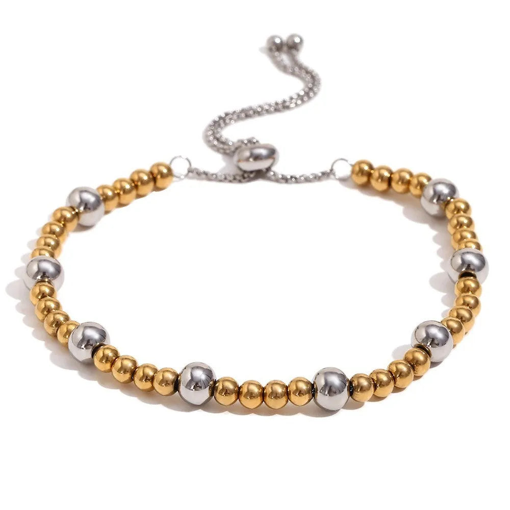 Gold geometric jewellery set with earrings, bracelet and necklace for women