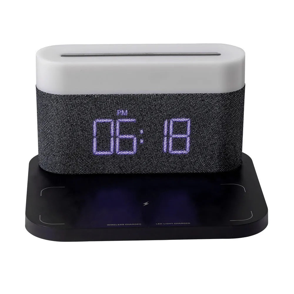 White bedside table lamp with integrated wireless phone charger and clock display