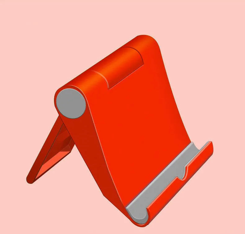 Black PE folding stand holding a smartphone at an angle on a wooden table.