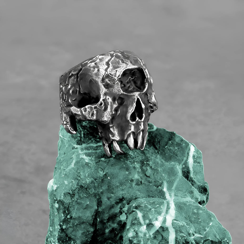 Alloy finger ring with a detailed one-eyed skull design in a retro punk style.