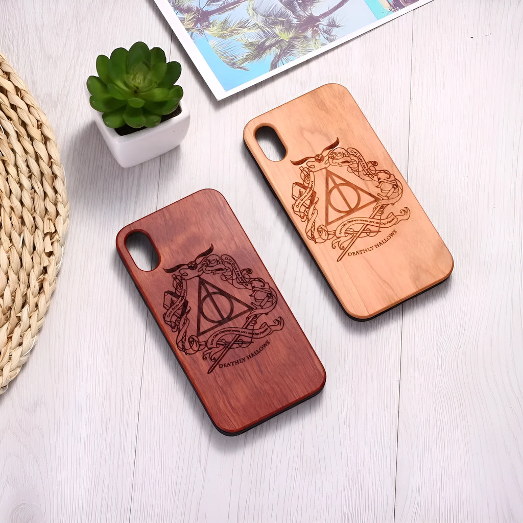 Wooden phone case with TPU frame showing laser-carved wood back and protective edges