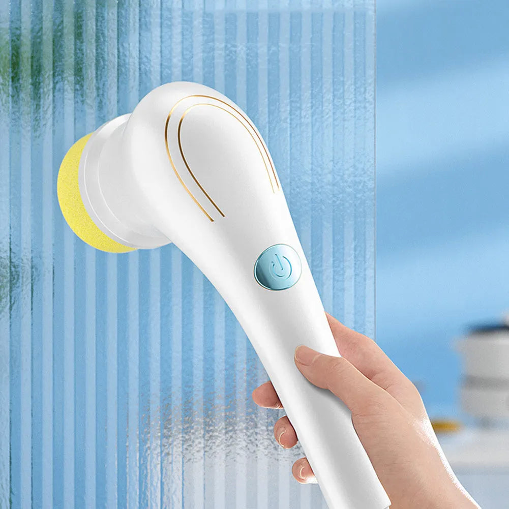 White USB electric handheld cleaning brush with five different brush heads for kitchen and bathroom surfaces.