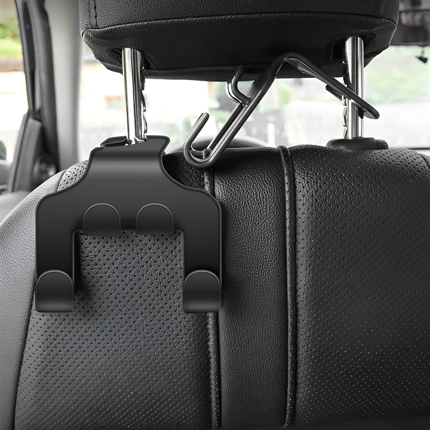 Pack of two black ABS plastic multifunction car hooks for mounting on dashboard or console.