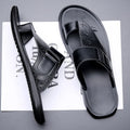 Men's casual leather beach slippers in light brown with an open toe and rubber sole