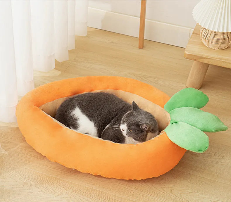 Carrot-shaped nesting dog bed with raised sides and a soft, washable blanket for small and medium pets